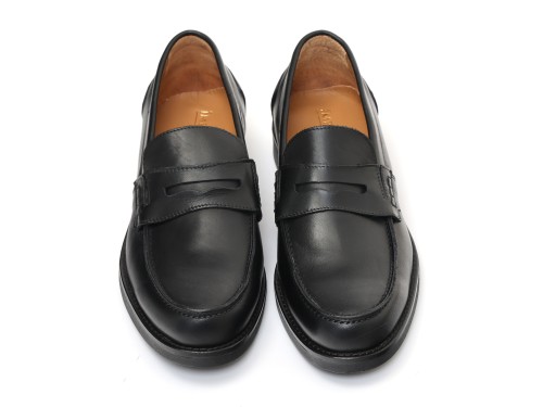 Mocassino con benda in pelle crust con fondo in gomma