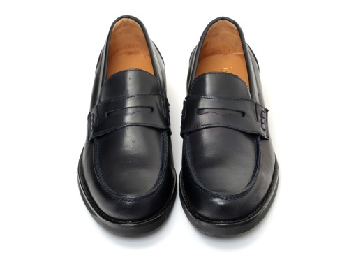 Mocassino con benda in pelle crust con fondo in gomma