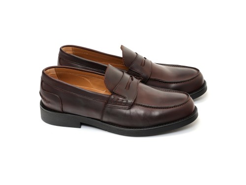 Mocassino con benda in pelle crust con fondo in gomma